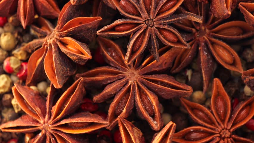 Close up of Star Anise, rotation in circle. star anise Turning. selective focus. Royalty-Free Stock Footage #1100650569