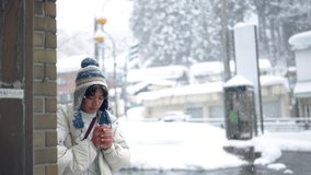 Young Asian man in winter coat choosing and buying hot drinks in beverage vending machine during travel small town in Japan in snow day. Handsome guy traveler travel local village on winter vacation. - Powered by Shutterstock - Get 15% off with code: PIKWIZARD15