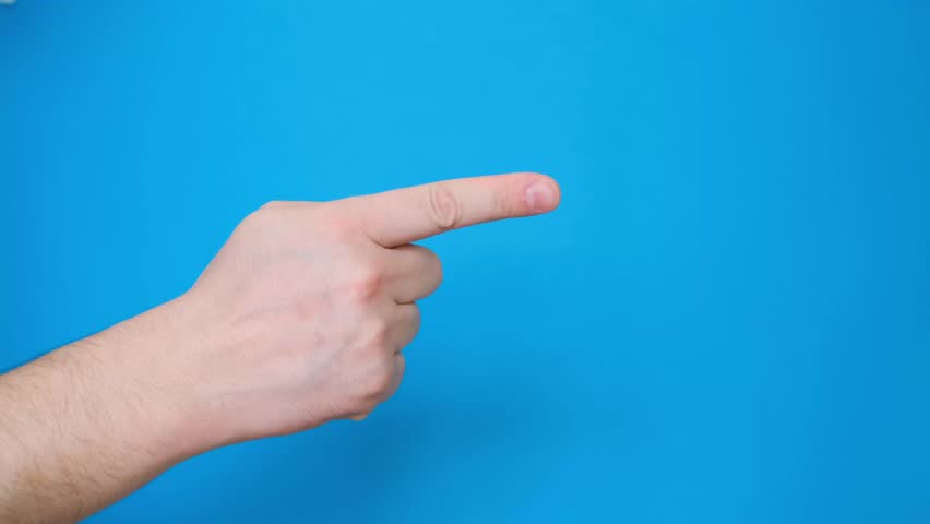  European man's hand showing index finger to side, gesture isolated on blue screen screen background | Shutterstock HD Video #1100651457
