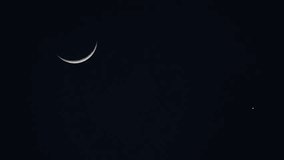 New moon with star at dusk. - Powered by Shutterstock - Get 15% off with code: PIKWIZARD15