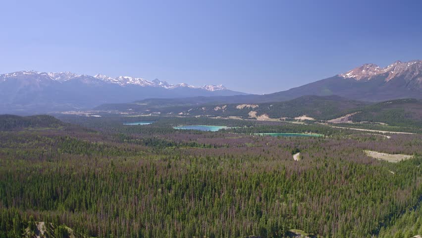 Aerial view of Jasper national park with blue lakes and blue sky glacier