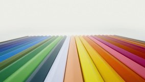 Extreme close-up colored pencils set on white background. Closeup multi-colored pencil set line up in a row, sharpened colorful pencils for drawing. Laowa 24mm probe lens, slider dolly macro shot - Powered by Shutterstock - Get 15% off with code: PIKWIZARD15