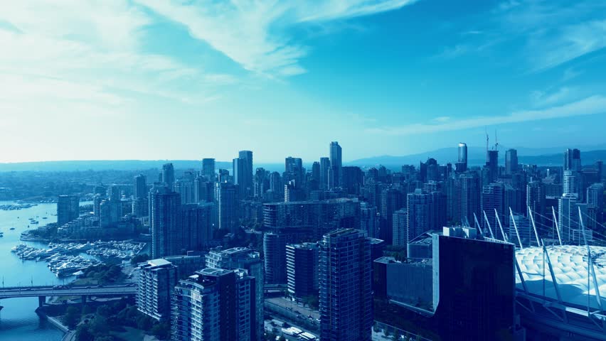 Vancouver Downtown Casino Stadium sunny summer day yachts docked Yaletown 4k Drone flyover modern architecture stunning new buildings overlooking birds top view calm water city traffic bridges parq