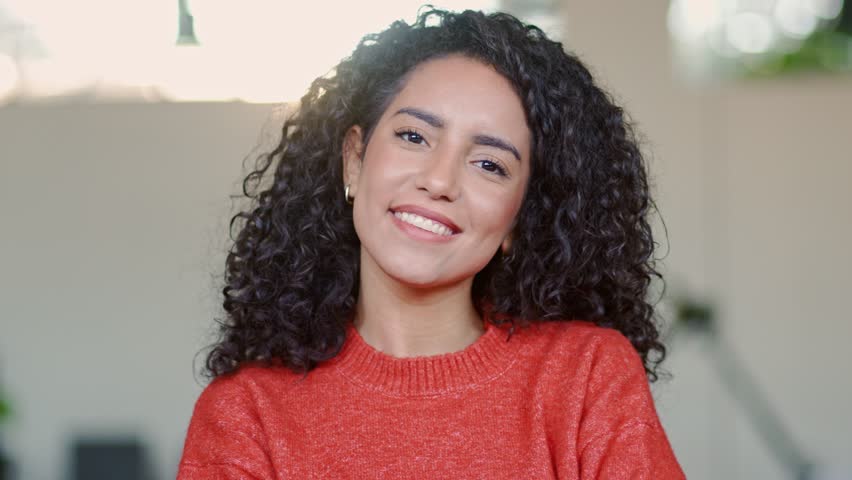 Young smiling happy professional latin business woman leader, happy female company worker or confident corporate manager agent standing in modern office, looking at camera, headshot portrait. Royalty-Free Stock Footage #1100677303