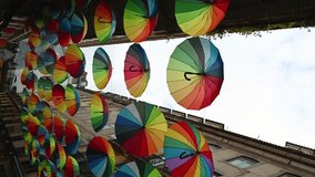 Umbrella with the rainbow pride flag vertically. 4K