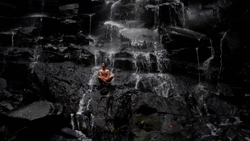 Young Man Relaxing In The Jungle Near Kanto Lampo Waterfall In Bali, Indonesia Royalty-Free Stock Footage #1100687785