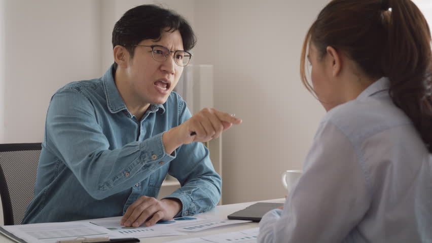 Bad CEO boss work argue point face stress rude yelling anger hate speech at female coworker. Two adult asia people man woman fight on meeting at office upset mad bossy male worker. Career job issue. | Shutterstock HD Video #1100692767