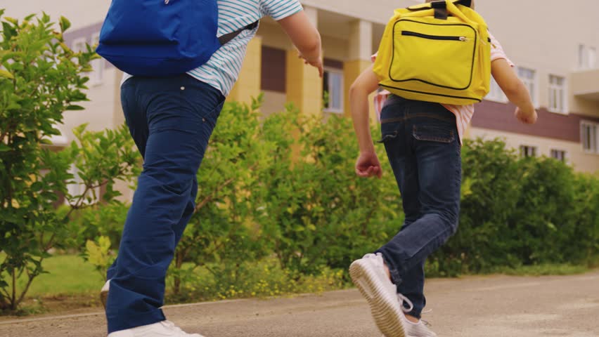 child boys run lesson school. friends classmates with school backpacks run classroom lesson. school students recess run school yard. chidhood dream. classmate catches up with boy. child game. Royalty-Free Stock Footage #1100693753