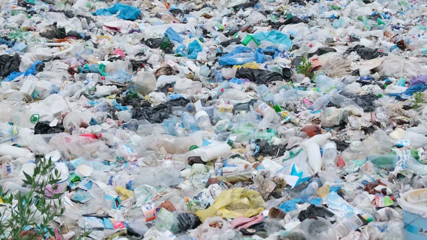 The concept of environmental pollution and environmental catastrophe. Mountains of garbage | Shutterstock HD Video #1100694227