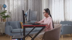 Asian Teen Girl Programmer Yawning And Sleeping While Creating Innovative Software Engineer Developing App, Program, Video Game On Desktop Computer At Home. Terminal With Coding Language 
