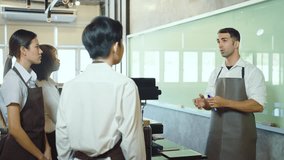 Male Teacher Explain to Students During Lesson About Project and Writting to Whiteboard. He explain equation point at whiteboard stand in classroom. Education, Chef, Learning, Lifestyle, Teching conce - Powered by Shutterstock - Get 15% off with code: PIKWIZARD15