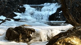 Ciucas Waterfall, Apuseni Mountains, Cluj County, Romania. Ciucas waterfall in winter season. Winter and snowy waterfall in the mountains