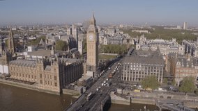High angle aerial drone shot flying towards Westminster and Big Ben over the River Thames - Powered by Shutterstock - Get 15% off with code: PIKWIZARD15