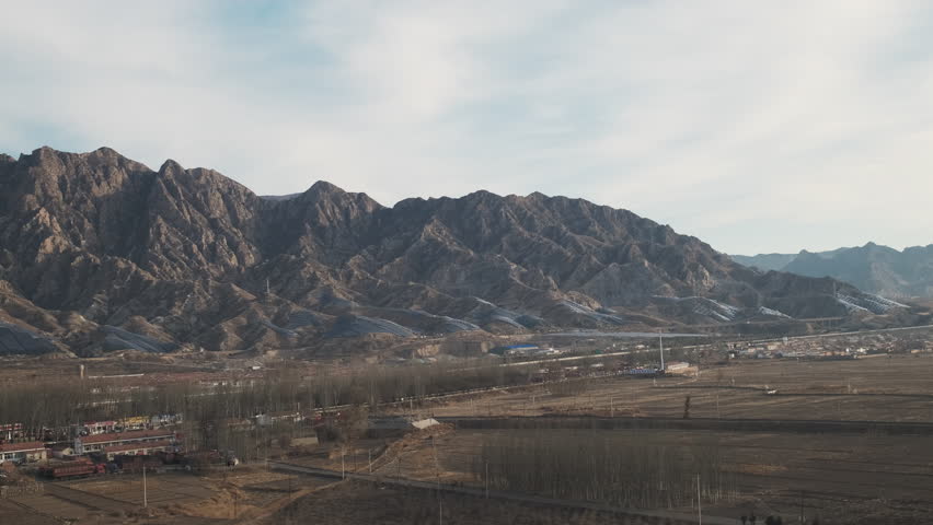 View out the window of China Beijing to Zhangjiakou high-speed railway bullet train