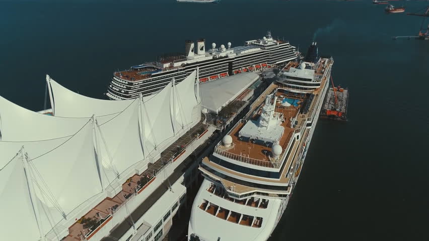 VANCOUVER : Cruise Ship at Canada Place Harbor in Vancouver, Canada. Famous Vancouver main cruise ship terminal, it was built in 1927. (aerial photography)