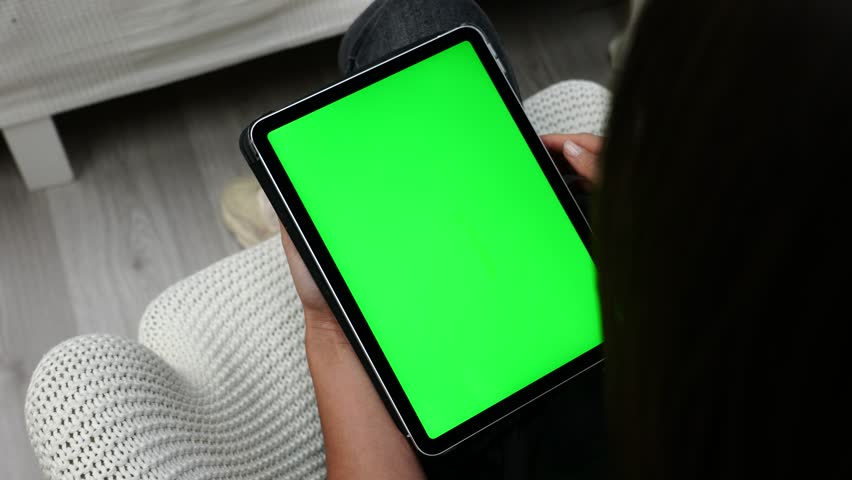Female Swiping on Tablet With Green Screen, Changing Online Pages, Close Up Royalty-Free Stock Footage #1100724107