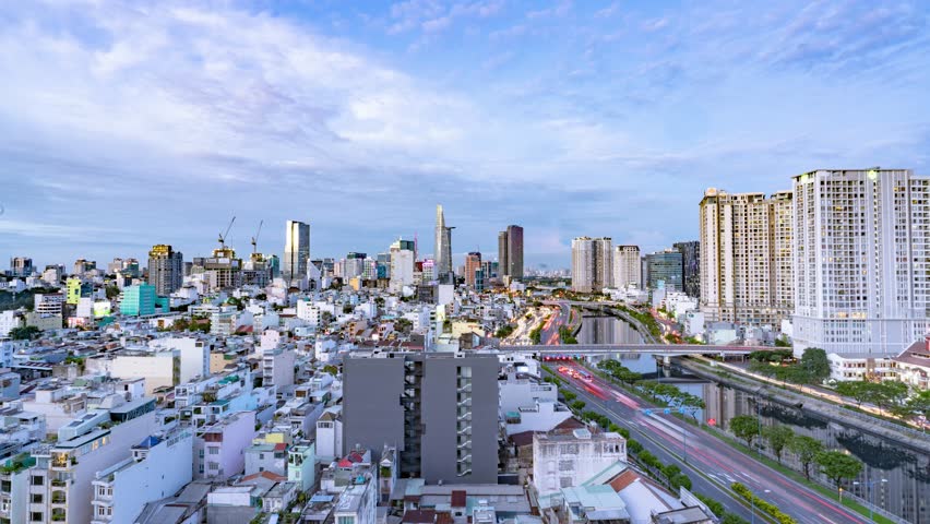 Saigon - Day to Night Time Lapse - High Wide Shot, North East View - Vietnam, Ho Chi Minh City