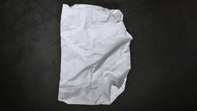 4K Crumpled Paper close-up animation on black background. folding open and closed top view modern design background
 - Powered by Shutterstock - Get 15% off with code: PIKWIZARD15