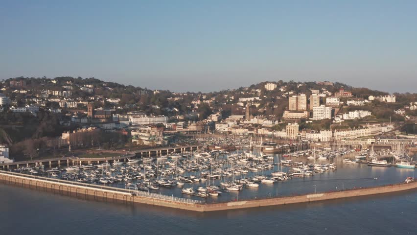 Torquay Harbour and Marina by the sea on a sunny summer evening