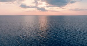 Nature video 4K Aerial view sea horizon as far as the eye can see One part sky, one part sea. Footage high quality ProRes 422HQ