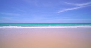Sea beach beautiful at sunny day, Beach sand blue seawater wave blue sky background beach wipeout tourism 
, Tropical sea Andaman South Thailand Location Phuket Thailand, High quality video ProRes 422