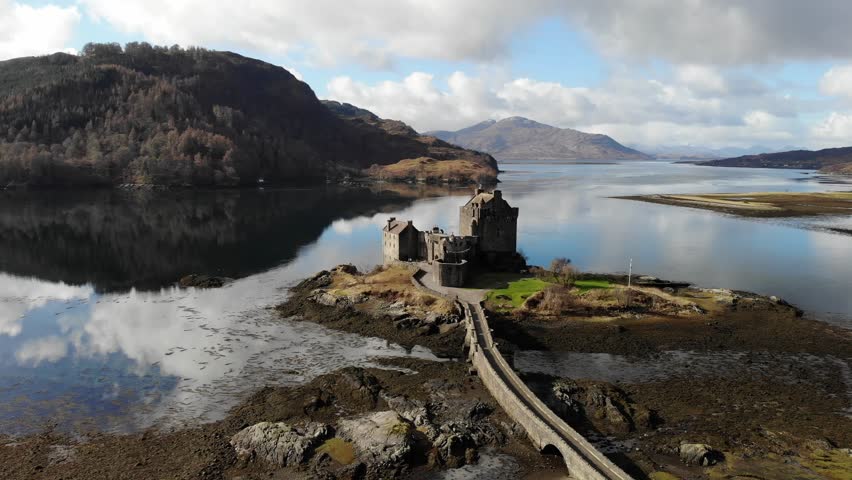 Scotland old castle on the lake Royalty-Free Stock Footage #1100739415