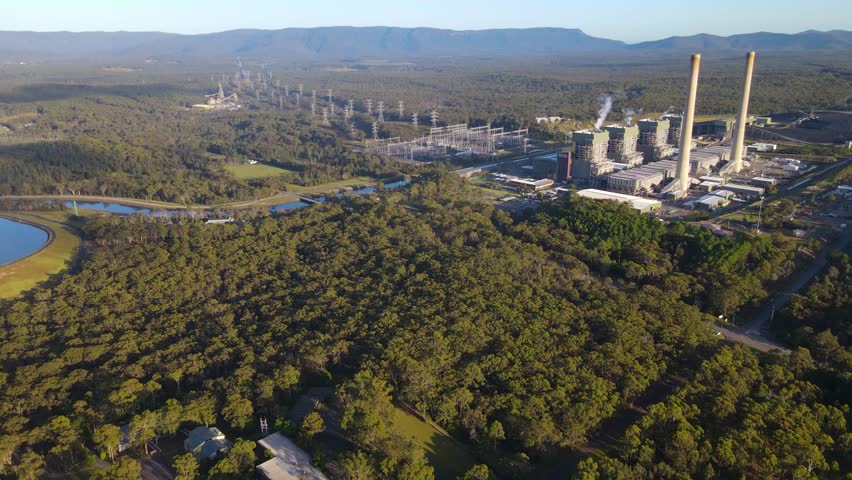 Aerial drone view of Eraring Power Station, Australia’s largest coal fired power station consisting of steam driven turbo alternators located at Eraring, NSW, Australia
