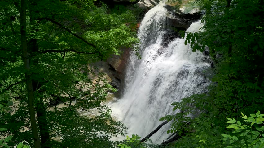 Brandywine Falls in Cuyahoga Valley National Park, Akron Ohio, Waterfall In A Green Wooded Forest
