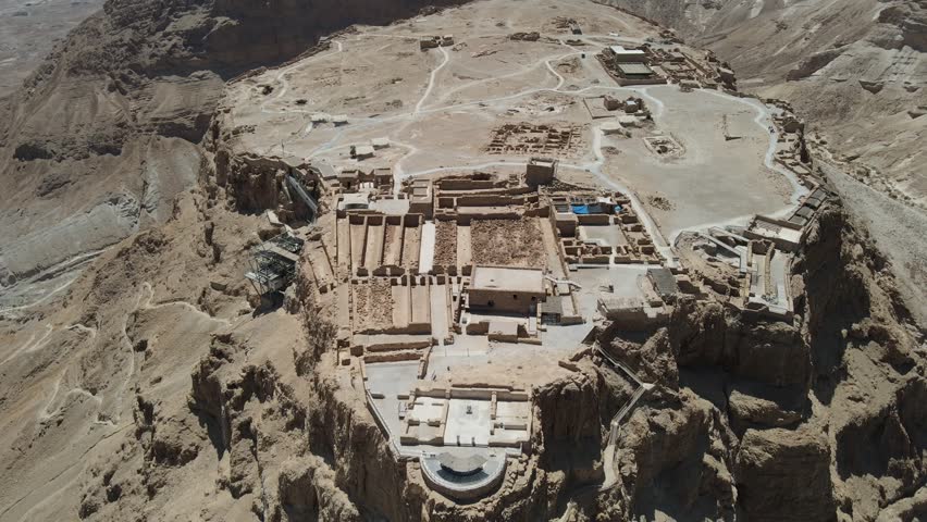 Masada is an ancient fortification in the Southern District of Israel situated on top of an isolated rock plateau, akin to a mesa, on the eastern edge of the Judean Desert, overlooking the Dead Sea 20
