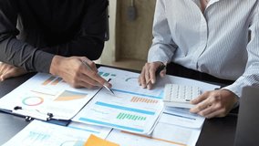 Financial analyst analysis business financial report on digital tablet during discussion at meeting of corporate showing the results of their successful teamwork., business meeting concept, Marketing	 - Powered by Shutterstock - Get 15% off with code: PIKWIZARD15