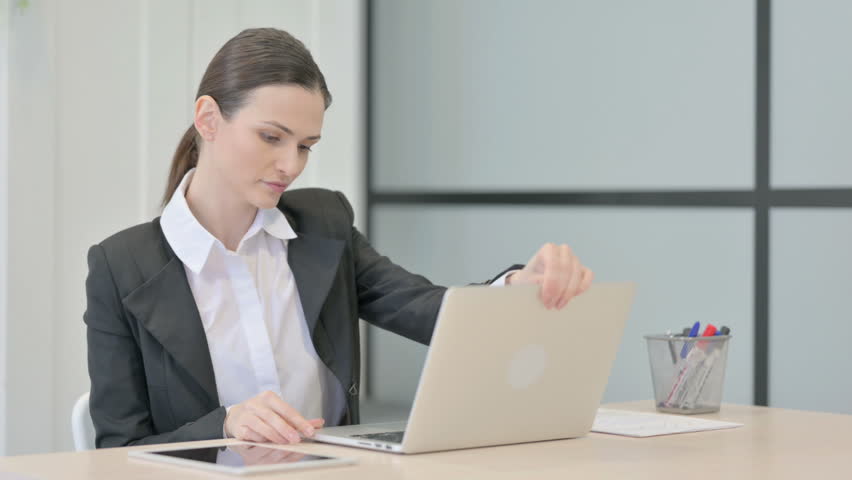 Businesswoman Coming Back to Office and Opening Laptop | Shutterstock HD Video #1100765987