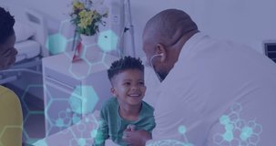 Animation of scientific data processing over african american male doctor with boy patient. Global medicine, computing and data processing concept digitally generated video.