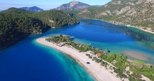 mediterranean bays and beach blue water sky drone footage aerial green pine trees oludeniz blue lagoon famous fethiye oludeniz turkey fethiye above