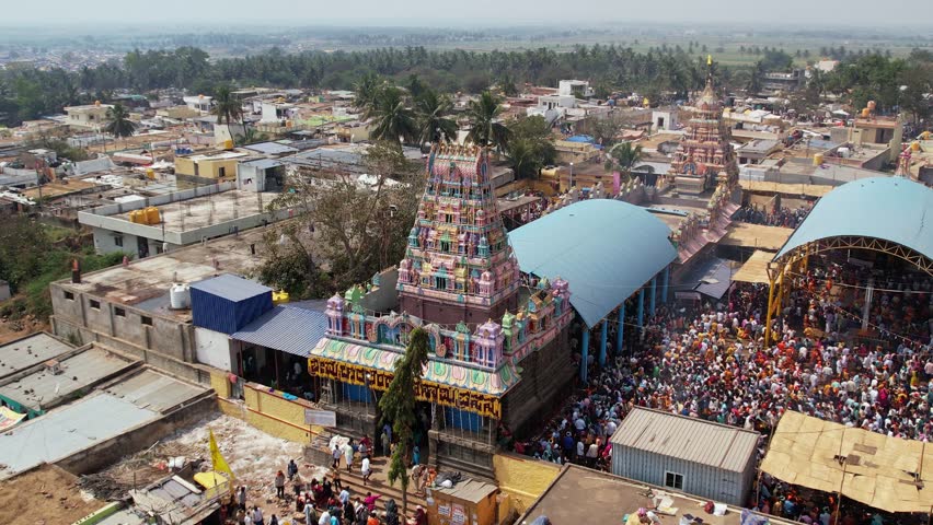 Aerial view of a huge crowd of people gathered at a temple during a Hindu religious festival karnikotsava or prophecy,mailaralingeshwara karnika