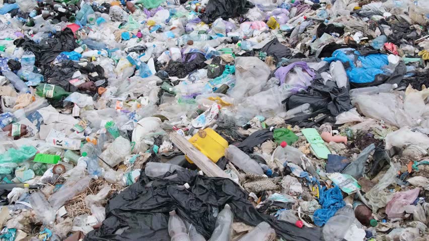 Plastic waste, environmental pollution. Contaminated ocean beaches with plastic | Shutterstock HD Video #1100792523