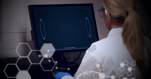 Animation of science data processing over female caucasian scientist. global science, connections, data processing and digital interface concept digitally generated video.