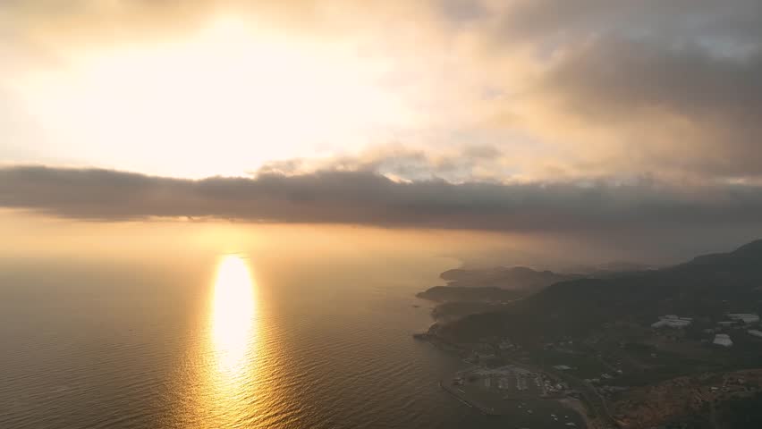 Cloudy sunset on the mediterranean sea aerial view 4 K