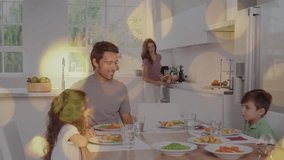 Animation of digital interface over caucasian family eating dinner. global business, technology and digital interface concept digitally generated video.
