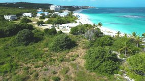 Shoal Bay, Anguilla. Turquoise sea of the British Caribbean. Calm and calm waters with many corals for snorkeling. Video drone Top View 4k.