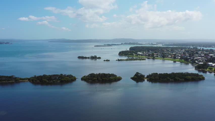 Swansea coastal town on Lake Macquarie of Australian Pacific shores aerial.
 Royalty-Free Stock Footage #1100802949