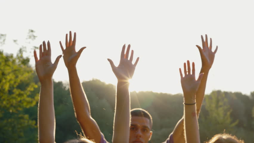 Multi Ethnic Group Raising Hands to the Sky. Close Up Volunteers Hands of Diverse Mixed Races People. Voting, Democracy or Volunteering Teamwork Concept Royalty-Free Stock Footage #1100804463