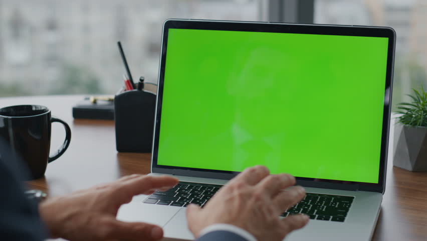 Unknown manager having video call on laptop green screen at modern office close up. Professional consultant talking on online conference using computer with chroma key. Man working on mockup device | Shutterstock HD Video #1100805667