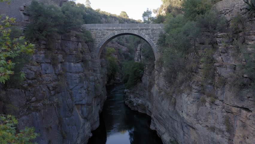 The ancient Roman Eurymedon or Oluk Kopru Bridge over the river Eurymedon, modern Koprucay River in the Koprulu Canyon in Turkey