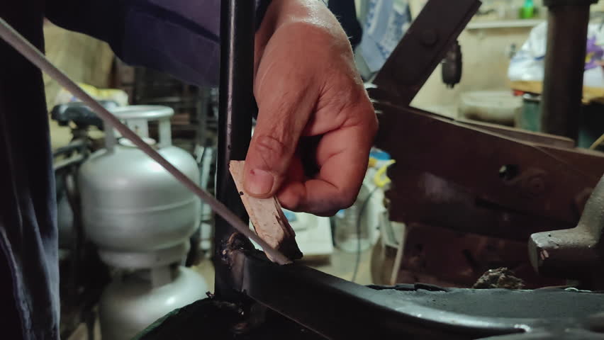 Old Man Repairing Broken Metal Chair Leg With Electric Welding Footage. | Shutterstock HD Video #1100806401