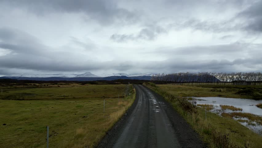 Lonely Road in Beautiful, Iceland Remote Landscape - Aerial Drone Flight with Copy Space