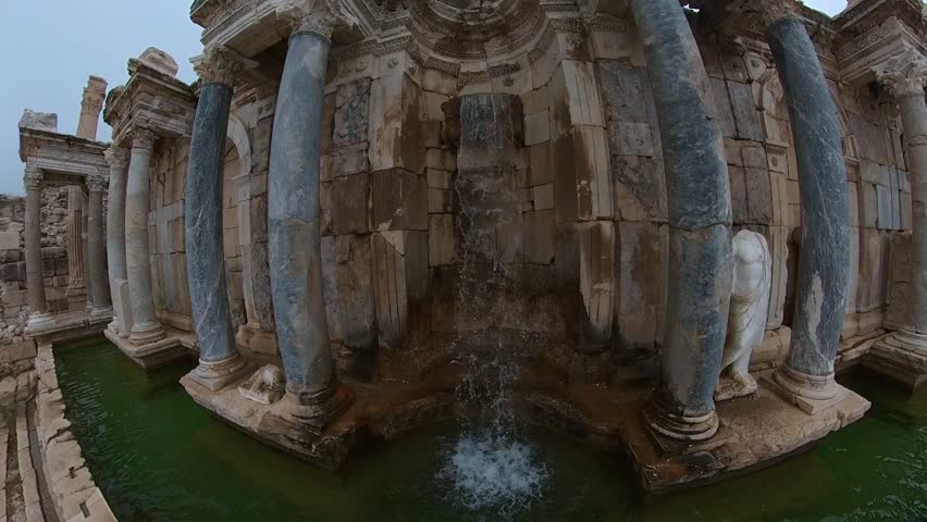 Sagalassos ancient city, Mystical view of the monumental Antonines fountain Nymphaeum in the mist. Turkey Burdur Ağlasun