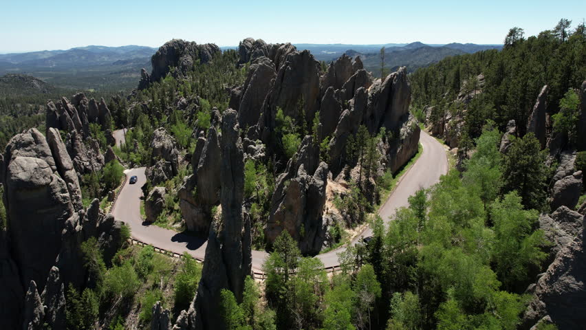 Aerial View of Road Between Scenic Rock Formations of Black Hills, Custer State Park, South Dakota USA