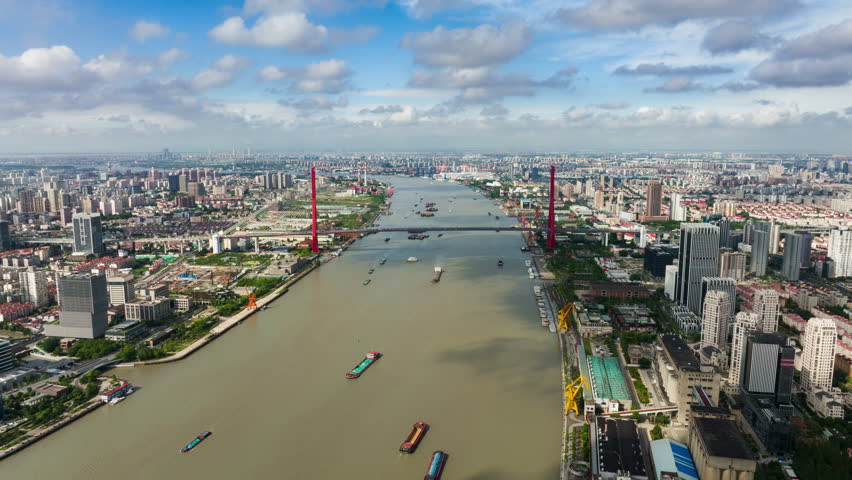 Aerial view of Yangpu Bridge and both sides of the Huangpu River in Shanghai. 4k Hyperlapse.