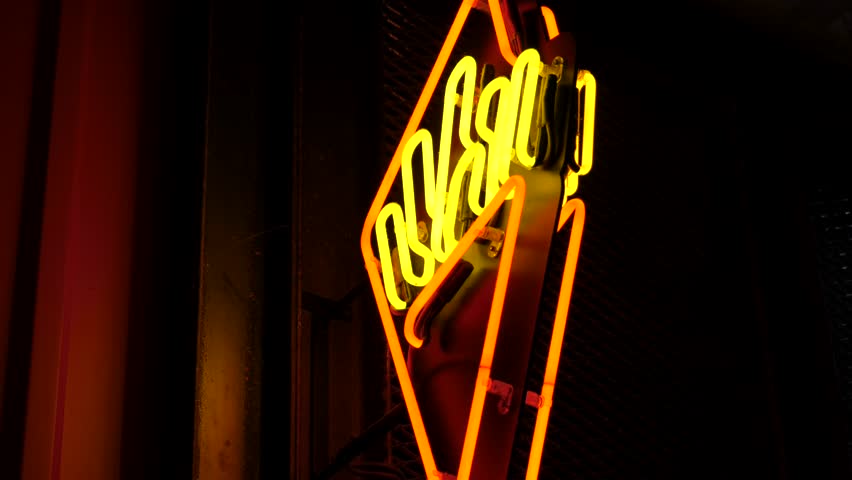 Chips, french fires bright neon light sign, generic downtown district fast food restaurant symbol at night, detail, closeup, nobody, no people. Nighttime, food service, gastronomy business concept | Shutterstock HD Video #1100828099