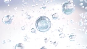 3D animation Cosmetics many atoms floating in the water. Particles inside a liquid bubble, cosmetic essence, and a liquid bubble on a background of water. - Powered by Shutterstock - Get 15% off with code: PIKWIZARD15